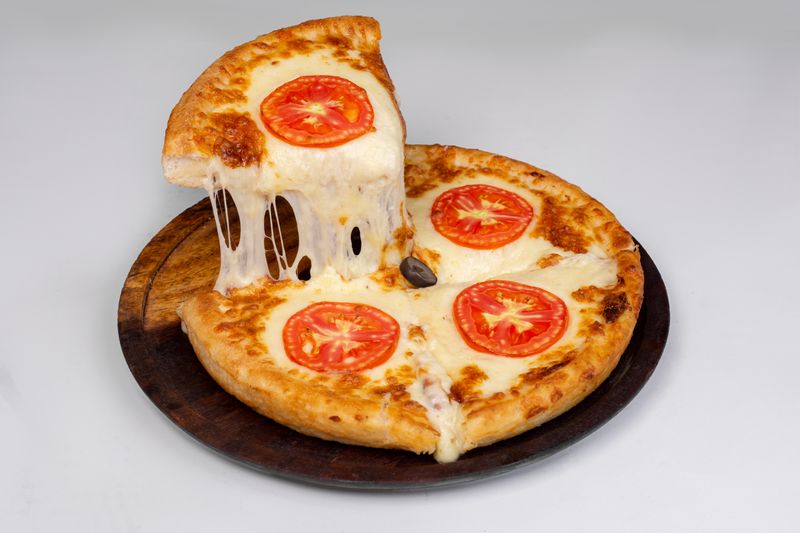 Four Cheese White pizza with premium cheese blend
